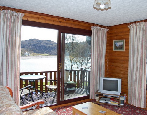 The chalet - Living room - looking out over Kirkaig  Bay.